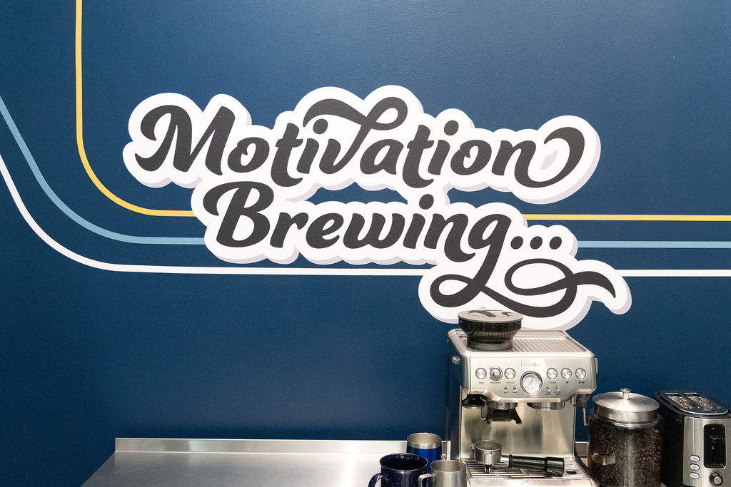 Motivation Brewing mural above the Fusion coffee bar